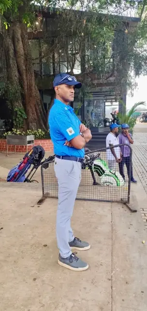 Tigers player at the JWGC clubhouse before a round