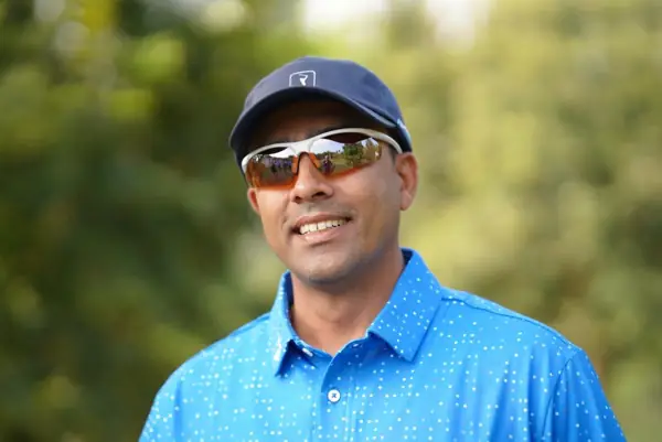 Smiling Tigers player in sports sunglasses
