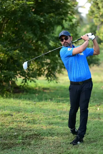 Tigers player follows through on a drive